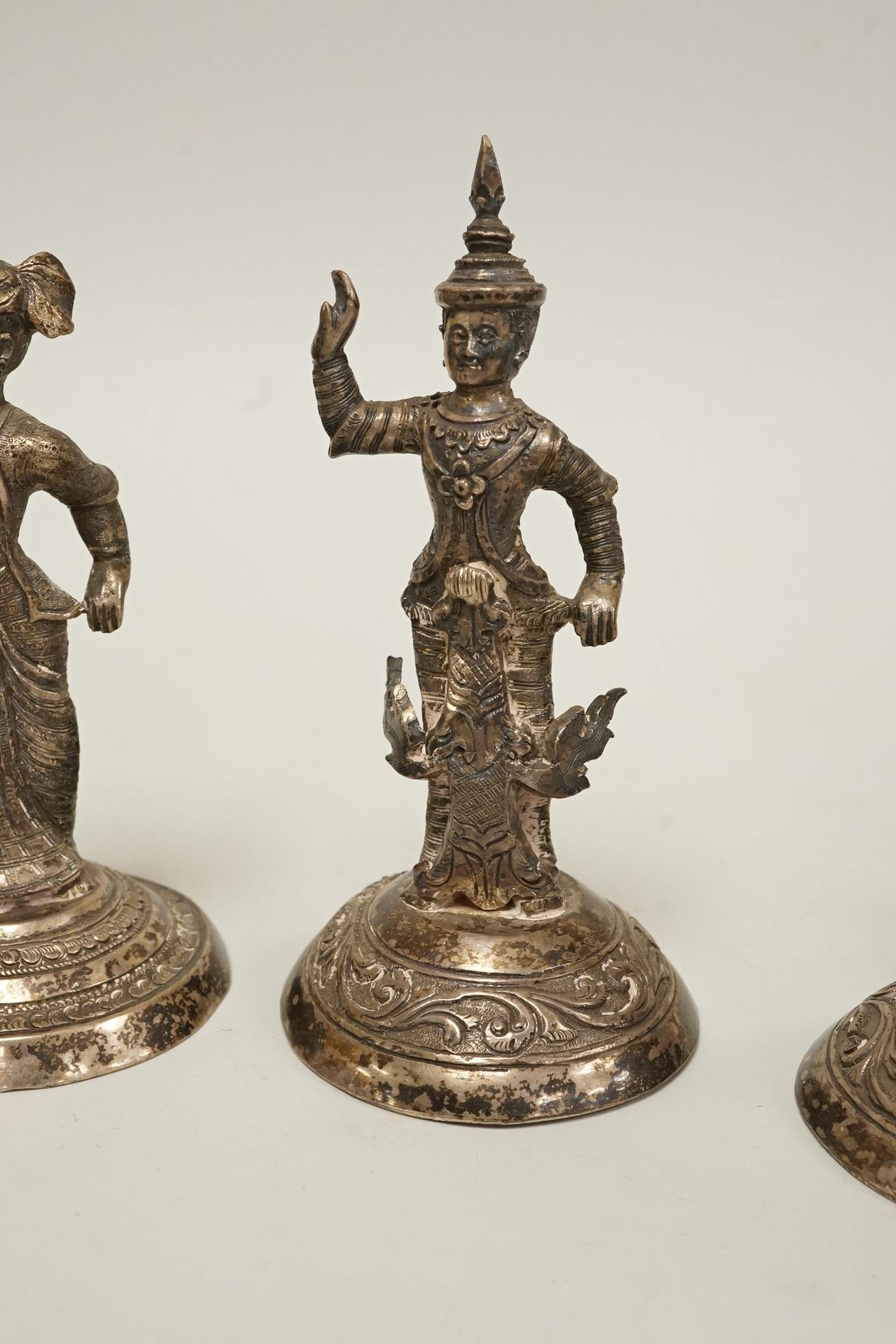 Four early 20th century Thai white metal figurines, 92mm et infra, 11.3oz.